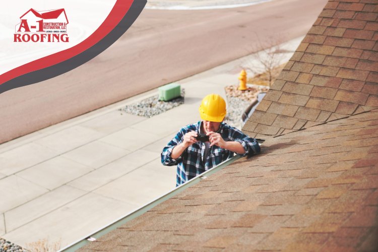 Certified roofing contractor inspecting East Moline roof