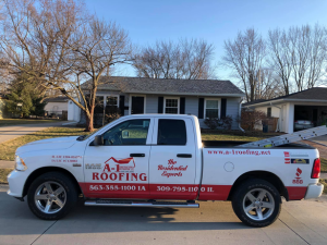 Installation of GAF Timberline® AS II shingles by East Moline roofing experts.
