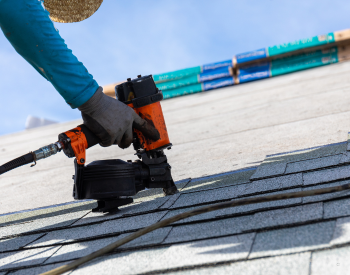 Roof repair in Davenport during the rainy season.