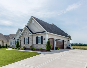 Residential roof protected from rain damage in Davenport.