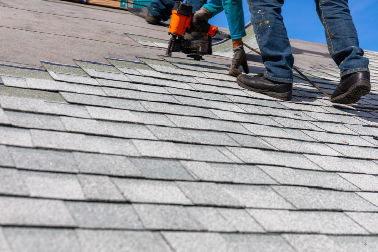 A-1 Roofing team performing roof replacement in Davenport.