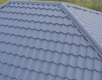 Reflective metal roof helping keep a home cool in East Moline.
